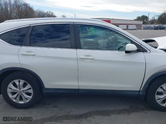 2012 Honda CR-V EX-L with VIN 5J6RM4H77CL000143, listed as a IAAI auction lot 41667946 with 218,934 mi miles. Bid and sale history available at carsss.com. Image 13.