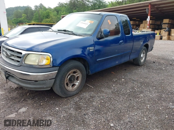 2002 Ford F-150 XL with VIN 1FTRX17W12NC06310, listed as a IAAI auction lot 42160213 with Not provided miles and . Bid and sale history available at DreamBid. Image 2.