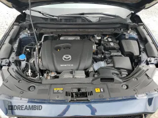 2021 Mazda CX-5 Grand Touring z VIN JM3KFBDM5M0464611, wystawiony jako Copart lot #62829065 z przebiegiem 20 525 mil mil oraz Nie do naprawy • Non repairable. Historia ofert i sprzedaży dostępna na DreamBid. Obrazek 12.