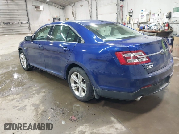 2013 Ford Taurus SEL with VIN 1FAHP2E82DG149828, listed as a IAAI auction lot 41910513 with 130,594 mi miles and . Bid and sale history available at carsss.com. Image 3.