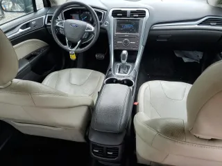 2016 Ford Fusion Titanium with VIN 3FA6P0K95GR158075, listed as a Copart auction lot 64476715 with 137,656 mi miles and Salvage title. Bid and sale history available at DreamBid. Image 8.