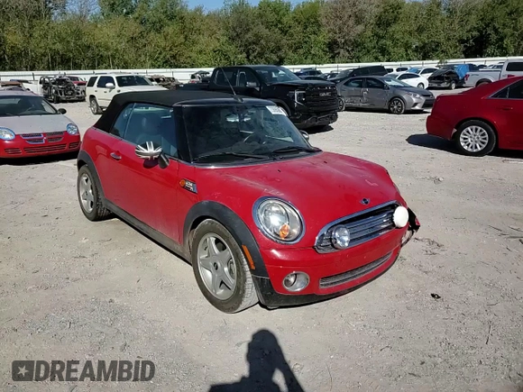 2009 MINI Convertible z VIN WMWMR335X9TU95073, wystawiony jako Copart lot #73690884 z przebiegiem 63 888 mil mil oraz Szkoda całkowita • Salvage title. Historia ofert i sprzedaży dostępna na DreamBid. Obrazek 11.