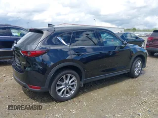 2019 Mazda CX-5 Grand Touring with VIN JM3KFBDM7K0518603, listed as a IAAI auction lot 39185478 with 42,805 mi miles. Bid and sale history available at carsss.com. Image 4.