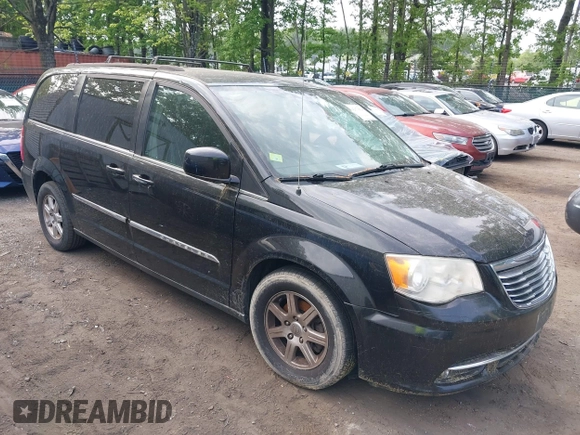 2012 Chrysler Town & Country Touring with VIN 2C4RC1BG7CR301101, listed as a IAAI auction lot 42173814 with 141,128 mi miles. Bid and sale history available at carsss.com. Image 1.
