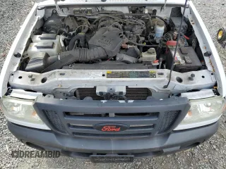 2010 Ford Ranger with VIN 1FTLR1EE1APA37032, listed as a Copart auction lot 82587614 with 215,440 mi miles and Salvage Title. Bid and sale history available at DreamBid. Image 11.