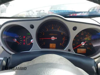 2005 Nissan 350Z Touring z VIN JN1AZ36A45M759863, wystawiony jako IAAI lot #41989643 z przebiegiem 36 758 mil mil oraz . Historia ofert i sprzedaży dostępna na DreamBid. Obrazek 7.