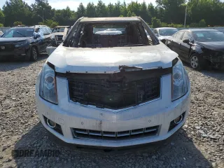2016 Cadillac SRX Performance Collection с VIN 3GYFNCE36GS505053, выставлен на аукционе Copart как лот 60060604 с пробегом Не указан миль и На запчасти • Non repairable. История ставок и продаж доступна на DreamBid. Изображение 5.