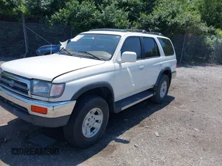 1998 Toyota 4Runner SR5 z VIN JT3HN86R2W0140234, wystawiony jako IAAI lot #42413268 z przebiegiem 187 772 mil mil oraz . Historia ofert i sprzedaży dostępna na DreamBid. Obrazek 2.