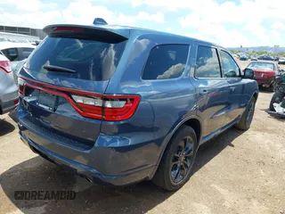 2021 Dodge Durango SXT Plus with VIN 1C4RDHAG6MC846496, listed as a IAAI auction lot 42398043 with 56,128 mi miles and . Bid and sale history available at DreamBid. Image 4.