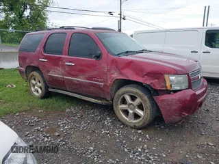 2010 Chevrolet Tahoe LTZ with VIN 1GNUKCE08AR214695, listed as a IAAI auction lot 42188377 with 278,326 mi miles and . Bid and sale history available at DreamBid. Image 1.