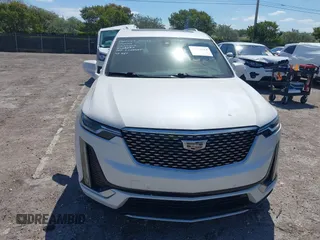 2020 Cadillac XT6 FWD Premium Luxury z VIN 1GYKPCRS1LZ228982, wystawiony jako IAAI lot #41975364 z przebiegiem 84 803 mil mil oraz . Historia ofert i sprzedaży dostępna na DreamBid. Obrazek 6.