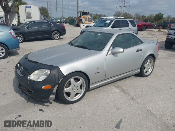 1999 Mercedes-Benz SLK 230/320 with VIN WDBKK47F1XF086736, listed as a IAAI auction lot 41580240 with 56,822 mi miles and . Bid and sale history available at DreamBid. Image 2.