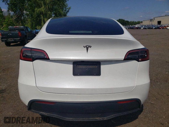 2024 Tesla Model Y with VIN 7SAYGDED9RF133701, listed as a Copart auction lot 64060785 with Not provided miles and Salvage title. Bid and sale history available at DreamBid. Image 6.