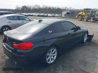 2014 BMW 4 Series 435i xDrive with VIN WBA3R5C54EK188957, listed as a IAAI auction lot 41790183 with 97,981 mi miles. Bid and sale history available at carsss.com. Image 4.