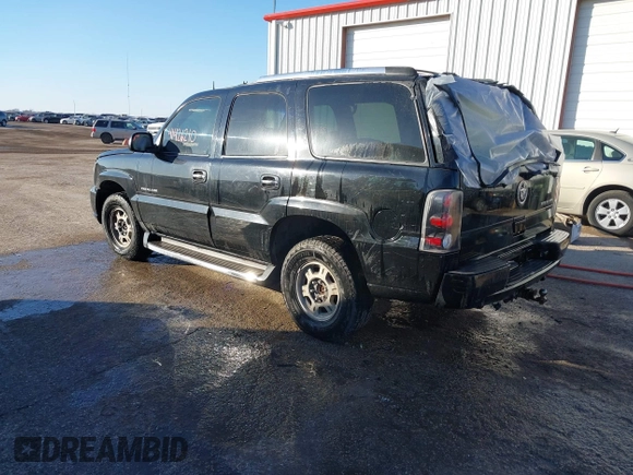 2003 Cadillac Escalade z VIN 1GYEK63N63R196238, wystawiony jako IAAI lot #41426210 z przebiegiem 296 853 mil mil oraz . Historia ofert i sprzedaży dostępna na DreamBid. Obrazek 3.