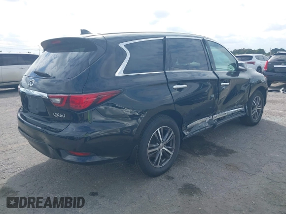 2019 Infiniti QX60 LUXE with VIN 5N1DL0MN0KC549578, listed as a IAAI auction lot 41362311 with 162,457 mi miles. Bid and sale history available at carsss.com. Image 4.