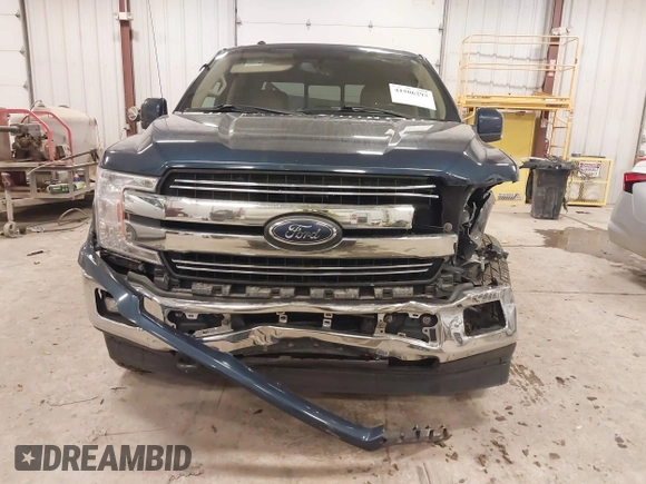 2018 Ford F-150 XL with VIN 1FTEW1EP4JFA00923, listed as a IAAI auction lot 41506293 with 153,523 mi miles and . Bid and sale history available at DreamBid. Image 6.