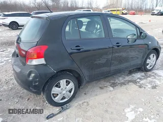 2010 Toyota Yaris with VIN JTDKT4K35A5280923, listed as a IAAI auction lot 41270556 with 175,643 mi miles. Bid and sale history available at carsss.com. Image 4.