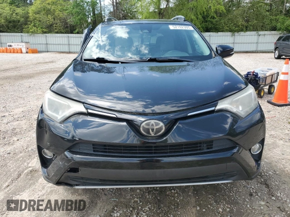 2018 Toyota RAV4 XLE with VIN 2T3RFREV7JW697470, listed as a Copart auction lot 52192305 with 109,420 mi miles and Salvage Title. Bid and sale history available at carsss.com. Image 5.