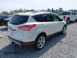 2016 Ford Escape Titanium with VIN 1FMCU9J93GUA40252, listed as a IAAI auction lot 42000778 with 37,914 mi miles. Bid and sale history available at carsss.com. Image 4.