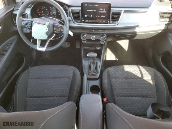 2023 Kia Rio S with VIN 3KPA24AD4PE525135, listed as a Copart auction lot 49104065 with 6,415 mi miles and Salvage Title. Bid and sale history available at carsss.com. Image 8.