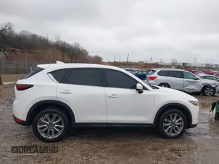 2021 Mazda CX-5 Grand Touring with VIN JM3KFADM4M1340141, listed as a IAAI auction lot 41194711 with 37,887 mi miles. Bid and sale history available at carsss.com. Image 13.