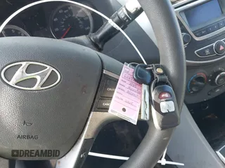 2015 Hyundai Accent GLS with VIN KMHCT4AE5FU907085, listed as a IAAI auction lot 41844688 with 156,384 mi miles. Bid and sale history available at carsss.com. Image 11.