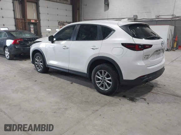 2023 Mazda CX-5 2.5 S with VIN JM3KFBAMXP0153362, listed as a IAAI auction lot 41875188 with 57,648 mi miles. Bid and sale history available at carsss.com. Image 3.