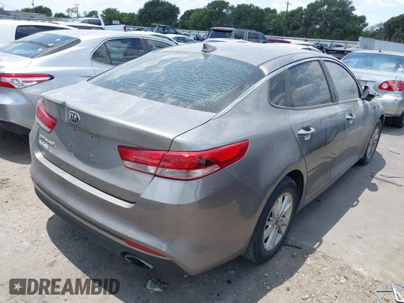 2016 Kia Optima LX with VIN 5XXGT4L32GG073267, listed as a IAAI auction lot 37153293 with 193,858 mi miles. Bid and sale history available at carsss.com. Image 4.