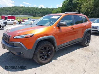 2016 Jeep Cherokee Trailhawk with VIN 1C4PJMBS6GW318035, listed as a IAAI auction lot 42652034 with 187,519 mi miles and . Bid and sale history available at DreamBid. Image 2.