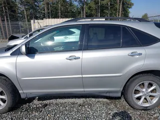 2008 Lexus RX with VIN 2T2HK31U38C069679, listed as a IAAI auction lot 42119684 with 134,196 mi miles. Bid and sale history available at carsss.com. Image 14.