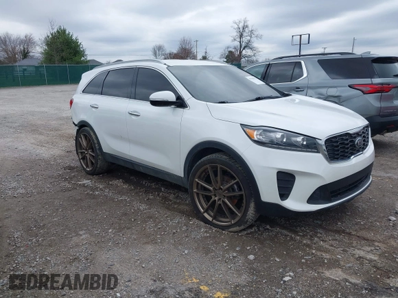 2019 Kia Sorento LX with VIN 5XYPG4A30KG524272, listed as a IAAI auction lot 41786623 with 124,942 mi miles and . Bid and sale history available at carsss.com. Image 1.