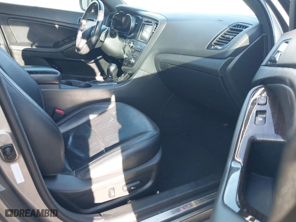 2013 Kia Optima SX w/Limited Pkg with VIN 5XXGR4A67DG191290, listed as a IAAI auction lot 41864684 with 136,525 mi miles. Bid and sale history available at carsss.com. Image 5.