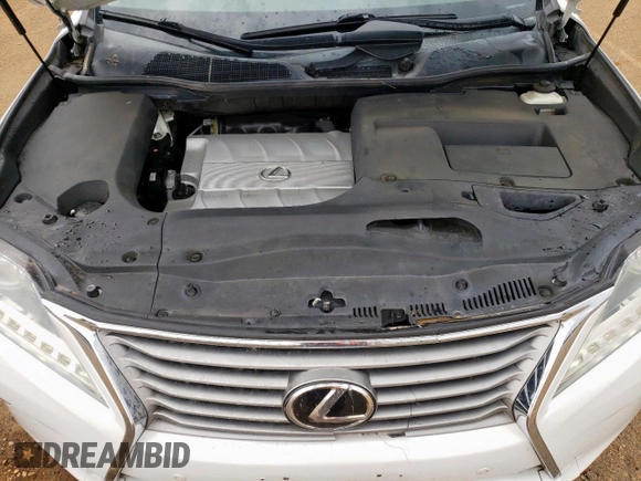 2013 Lexus RX 350 z VIN 2T2BK1BA7DC180812, wystawiony jako Copart lot #57476565 z przebiegiem 130 727 mil mil oraz Szkoda całkowita • Salvage title. Historia ofert i sprzedaży dostępna na DreamBid. Obrazek 12.