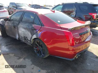 2016 Cadillac CTS-V z VIN 1G6A15S66G0150126, wystawiony jako IAAI lot #41638938 z przebiegiem Nie podano mil oraz . Historia ofert i sprzedaży dostępna na DreamBid. Obrazek 3.