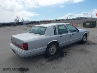 1994 Lincoln Town Car Signature with VIN 1LNLM82W4RY783450, listed as a IAAI auction lot 41858575 with 183,789 mi miles. Bid and sale history available at carsss.com. Image 4.