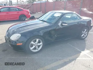 2003 Mercedes-Benz SLK-Class 3.2L with VIN WDBKK65F43F281612, listed as a IAAI auction lot 41674178 with 153,517 mi miles. Bid and sale history available at carsss.com. Image 2.