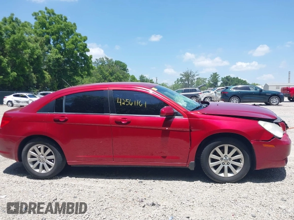 2010 Chrysler Sebring Limited with VIN 1C3CC5FB8AN133656, listed as a IAAI auction lot 42561161 with 145,785 mi miles and . Bid and sale history available at DreamBid. Image 13.