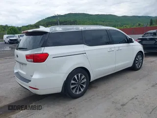 2015 Kia Sedona EX with VIN KNDMC5C14F6019067, listed as a IAAI auction lot 42045357 with 149,736 mi miles. Bid and sale history available at carsss.com. Image 4.