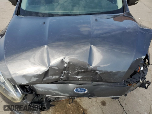2015 Ford Focus SE z VIN 1FADP3F29FL340350, wystawiony jako Copart lot #53466455 z przebiegiem 146 374 mil mil oraz Szkoda całkowita • Salvage title. Historia ofert i sprzedaży dostępna na DreamBid. Obrazek 12.