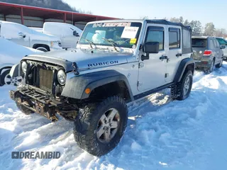 2008 Jeep Wrangler Unlimited Rubicon with VIN 1J4GA69198L615547, listed as a IAAI auction lot 41351138 with 213,487 mi miles and . Bid and sale history available at DreamBid. Image 2.