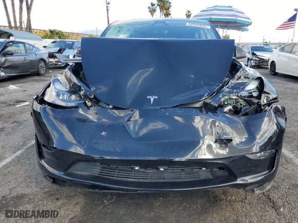 2024 Tesla Model Y Long Range with VIN 7SAYGAEE0RF062945, listed as a Copart auction lot 42835635 with 16,992 mi miles and Salvage Title. Bid and sale history available at carsss.com. Image 5.