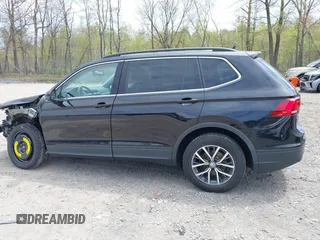 2019 Volkswagen Tiguan SE with VIN 3VV2B7AX7KM174382, listed as a IAAI auction lot 42147584 with 64,460 mi miles and . Bid and sale history available at DreamBid. Image 14.