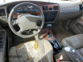 1999 Toyota 4Runner Limited with VIN JT3GN87R5X0115971, listed as a Copart auction lot 50742105 with 323,635 mi miles and Salvage Title. Bid and sale history available at DreamBid. Image 8.