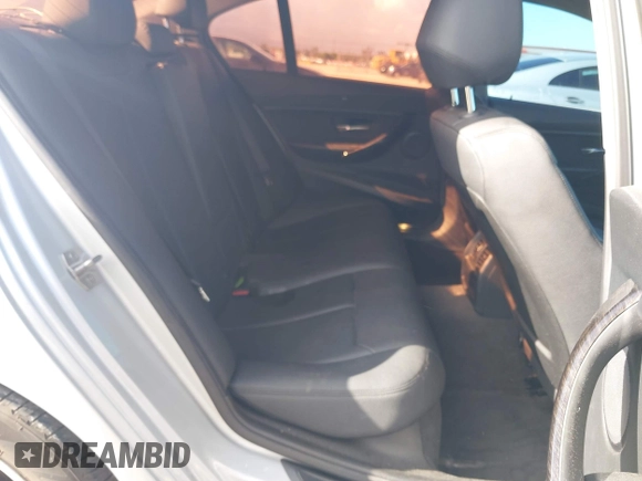 2015 BMW 3 Series 320i with VIN WBA3B1G53FNT05936, listed as a IAAI auction lot 42591667 with 143,594 mi miles and . Bid and sale history available at DreamBid. Image 8.
