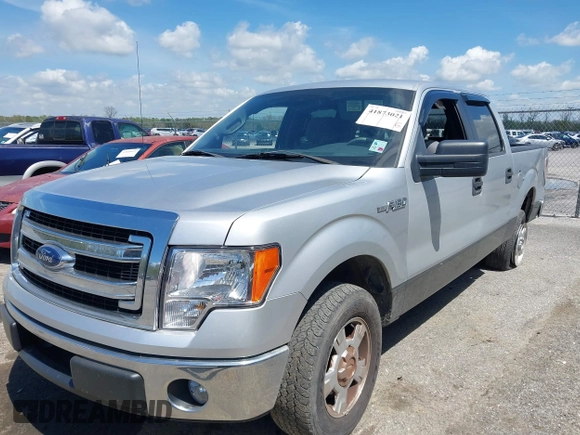 2013 Ford F-150 XL with VIN 1FTEW1CM2DFA62107, listed as a IAAI auction lot 41873021 with 149,648 mi miles and . Bid and sale history available at carsss.com. Image 2.
