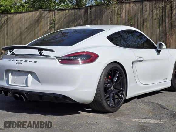 2016 Porsche Cayman S with VIN WP0AB2A88GK185895, listed as a Copart auction lot 54412305 with 27,100 mi miles and Salvage Title. Bid and sale history available at DreamBid. Image 4.