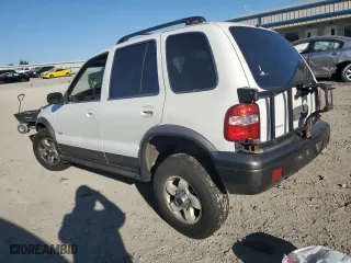 2002 Kia Sportage with VIN KNDJA723625142604, listed as a Copart auction lot 73463704 with 236,260 mi miles and Salvage Title. Bid and sale history available at carsss.com. Image 2.