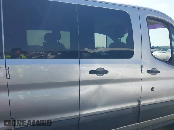 2015 Ford Transit XL with VIN 1FBZX2ZMXFKA31553, listed as a IAAI auction lot 41588965 with 204,796 mi miles and . Bid and sale history available at DreamBid. Image 13.