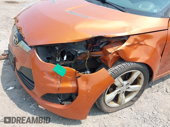 2012 Hyundai Veloster w/Gray Int с VIN KMHTC6AD0CU043402, выставлен на аукционе IAAI как лот 42406321 с пробегом 116 734 миль миль и . История ставок и продаж доступна на DreamBid. Изображение 6.